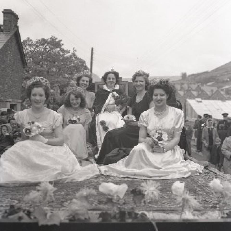 Photograph of Carnival Queen and attendants seated on carnival float, 26 May 1951.